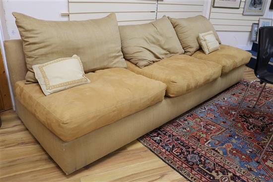 A large silk and faux suede sofa W.274cm